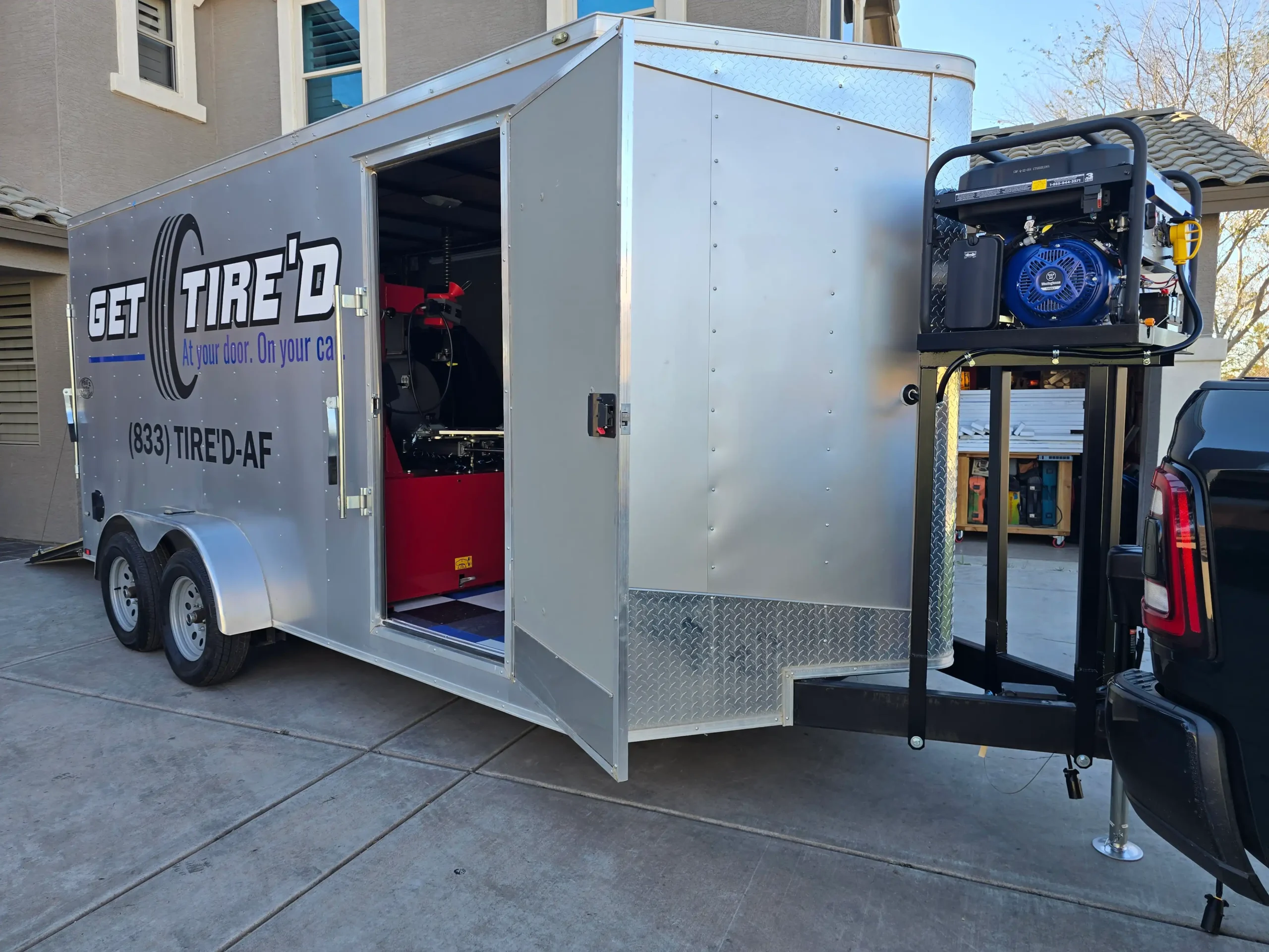 Get Tire'd mobile tire service trailer equipped for on-location tire installation